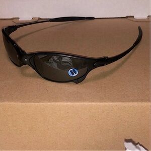 Rare. Oakley Juliet carbon black indrium polarized sunglasses